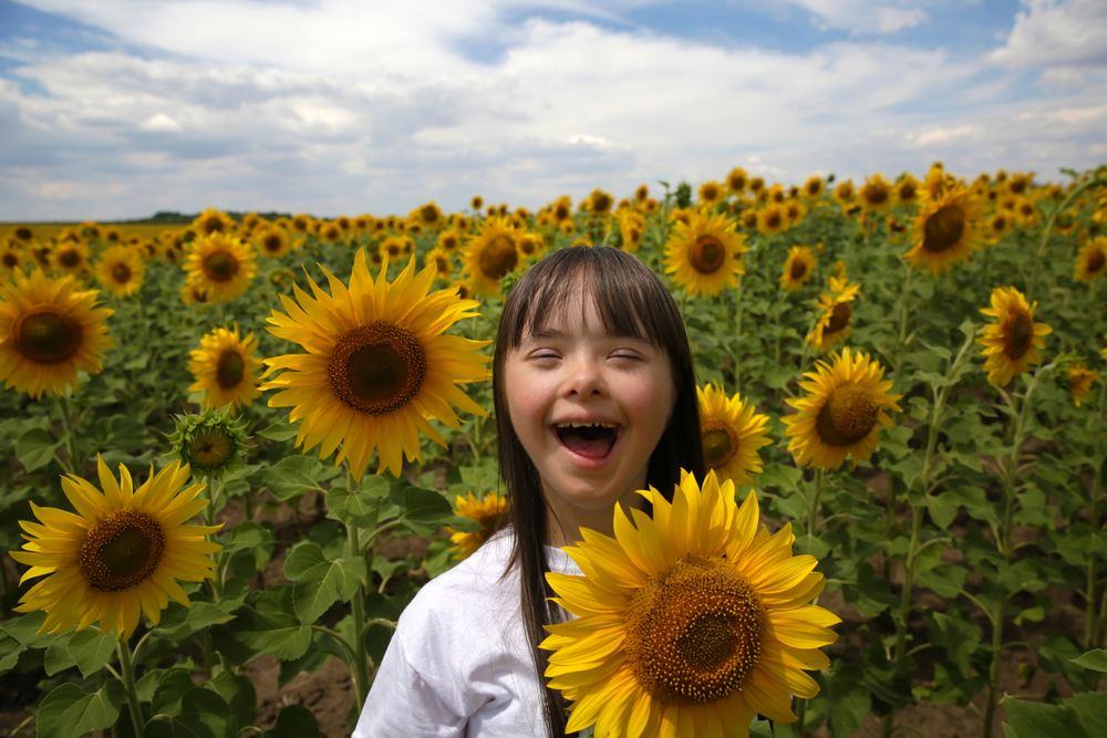ein Kind mit Down-Syndrome